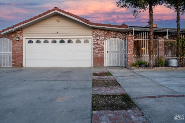 single story home featuring a garage