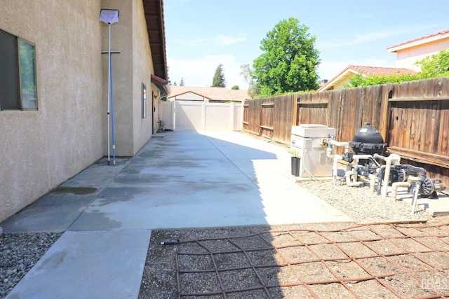 view of patio with a fenced backyard