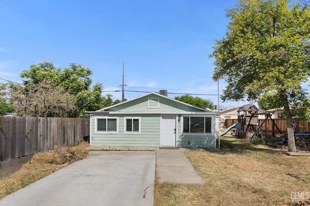 404 Colusa Ave, Chowchilla, CA 93610 - view of front of home with a playground