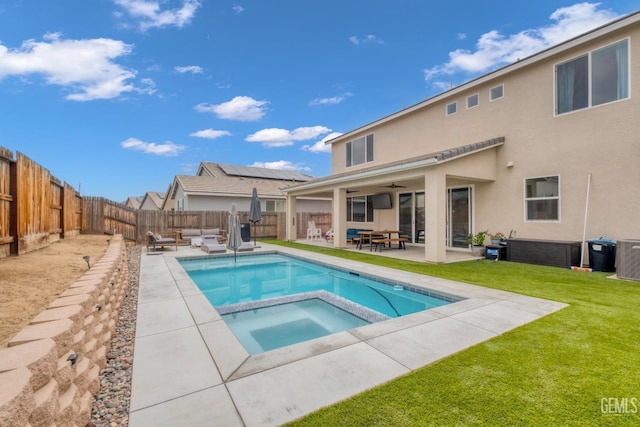 view of swimming pool with a patio area, a fenced backyard, a ceiling fan, and a yard