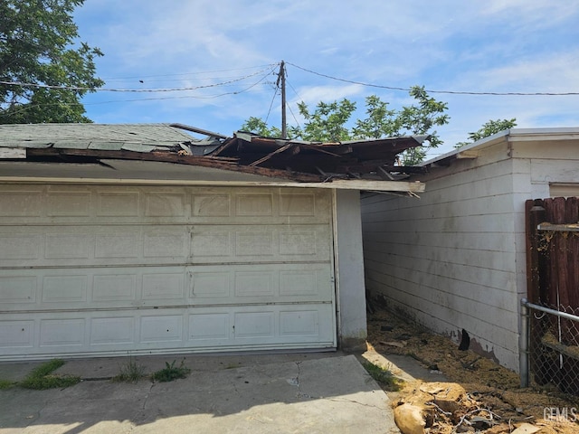 detached garage with fence