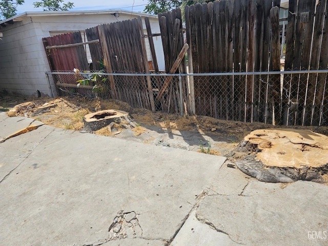 view of property exterior featuring fence
