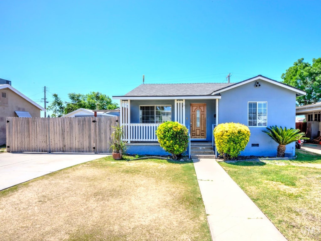 317 Minner Ave, Bakersfield, CA 93308 - bungalow-style house featuring a porch and stucco siding