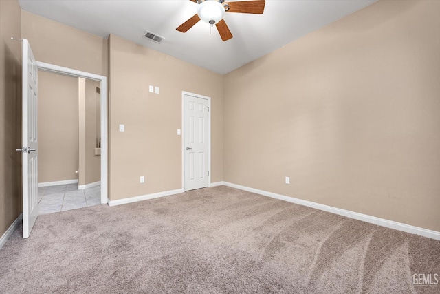 9713 Mona Lisa Ln, Bakersfield, CA 93312 - unfurnished bedroom with light colored carpet, baseboards, and ceiling fan