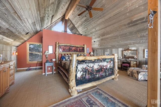 carpeted bedroom featuring baseboards, wood ceiling, and lofted ceiling