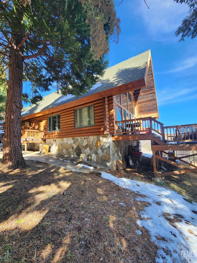 exterior space featuring log siding