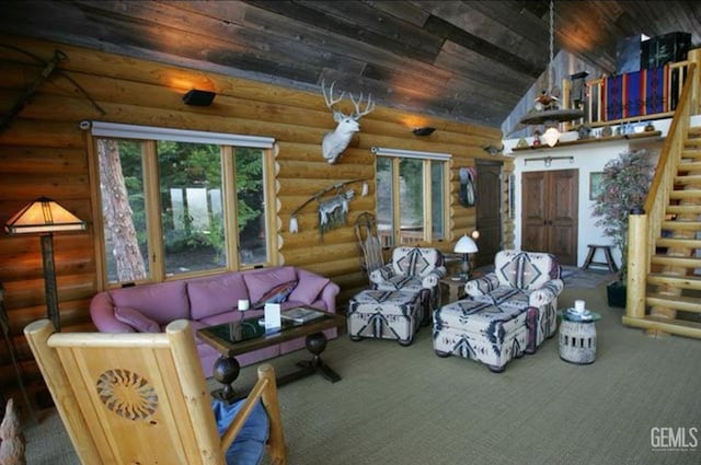 carpeted living room with high vaulted ceiling, wood ceiling, and stairs