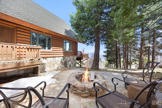 view of patio featuring a fire pit