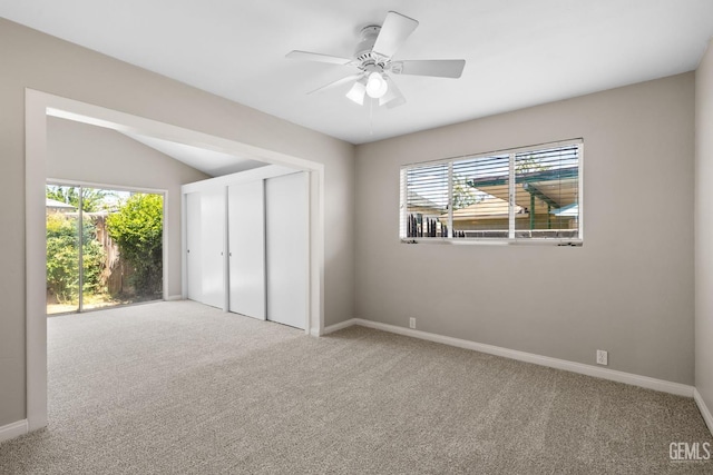 2613 Spruce St, Bakersfield, CA 93301 - unfurnished bedroom featuring carpet flooring, multiple windows, baseboards, and a ceiling fan