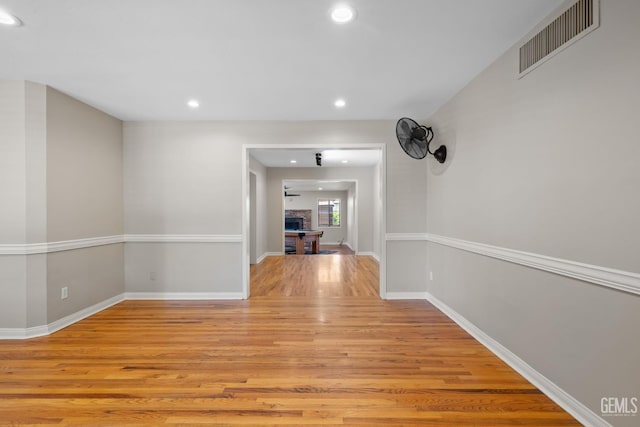 2613 Spruce St, Bakersfield, CA 93301 - corridor featuring light wood-style flooring, recessed lighting, and baseboards