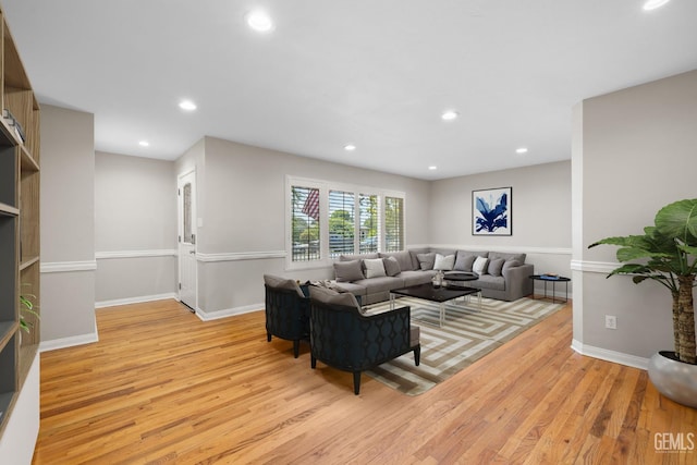 2613 Spruce St, Bakersfield, CA 93301 - living area with light wood-type flooring, baseboards, and recessed lighting