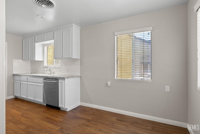 2613 Spruce St, Bakersfield, CA 93301 - kitchen with dishwasher, baseboards, dark wood-type flooring, and backsplash