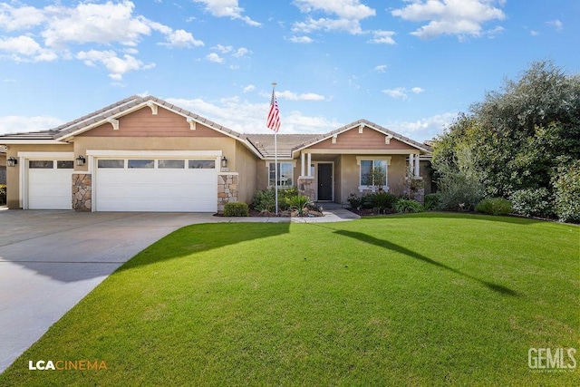 view of front of house featuring a garage and a front yard