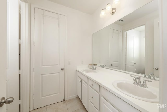 bathroom with vanity and tile patterned floors