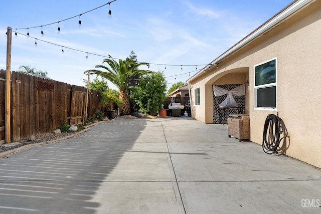 605 Cornelia St, Wasco, CA 93280 - fenced backyard with a patio