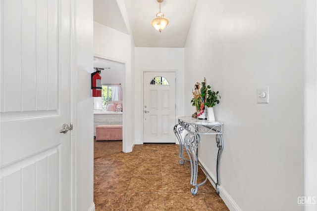 605 Cornelia St, Wasco, CA 93280 - entryway with vaulted ceiling and baseboards