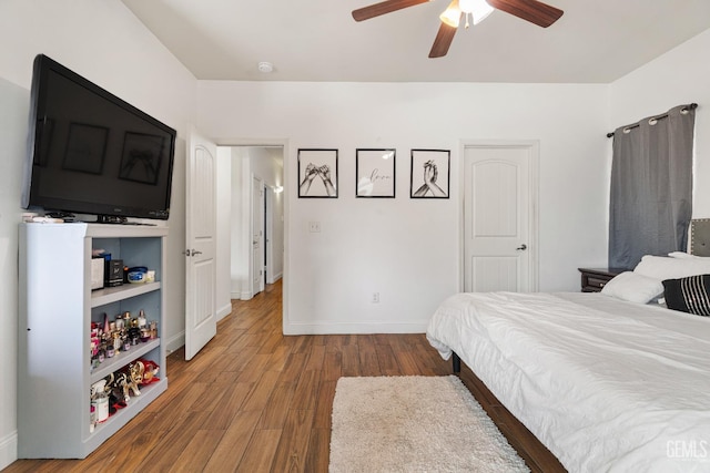 605 Cornelia St, Wasco, CA 93280 - bedroom featuring wood finished floors and a ceiling fan