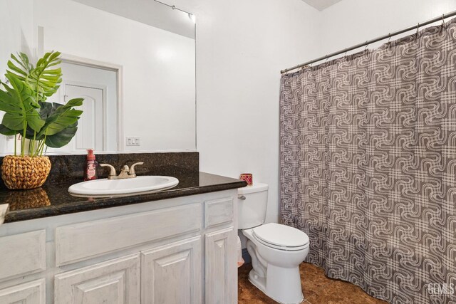 605 Cornelia St, Wasco, CA 93280 - bathroom with vanity and a shower with shower curtain