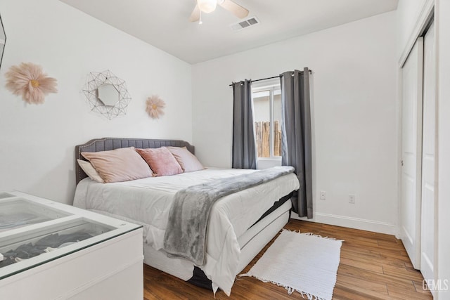605 Cornelia St, Wasco, CA 93280 - bedroom featuring a closet, wood finished floors, and a ceiling fan