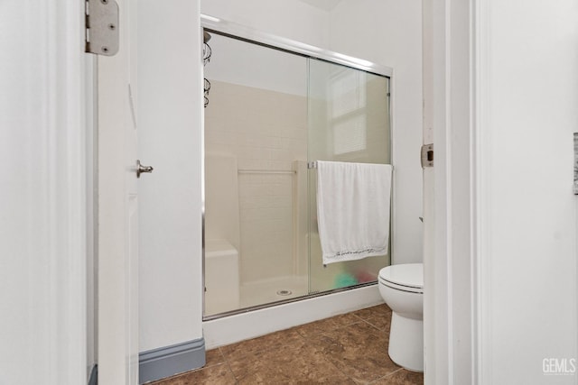 605 Cornelia St, Wasco, CA 93280 - full bathroom with a stall shower and tile patterned flooring