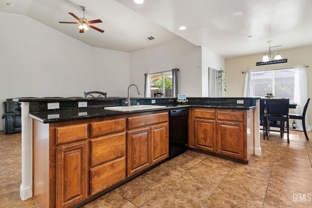 605 Cornelia St, Wasco, CA 93280 - kitchen with black dishwasher, a ceiling fan, brown cabinets, a chandelier, and dark stone counters