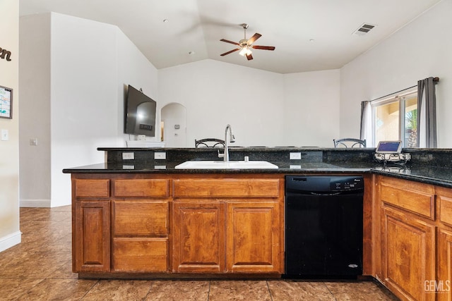 605 Cornelia St, Wasco, CA 93280 - kitchen featuring black dishwasher, a ceiling fan, lofted ceiling, brown cabinetry, and dark stone countertops