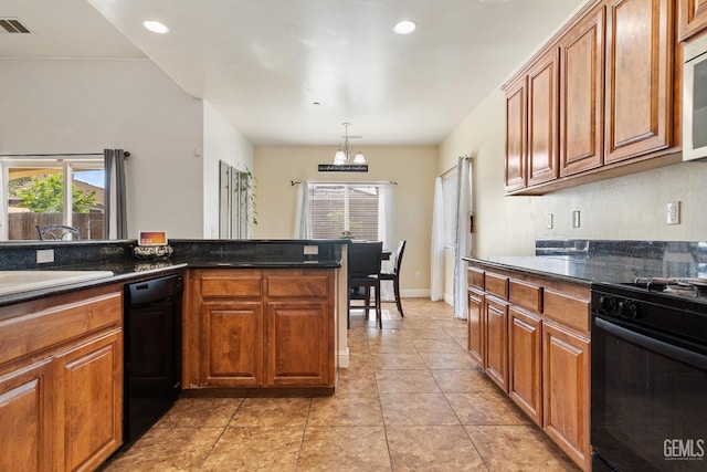 605 Cornelia St, Wasco, CA 93280 - kitchen with black appliances, a chandelier, brown cabinetry, light tile patterned floors, and recessed lighting