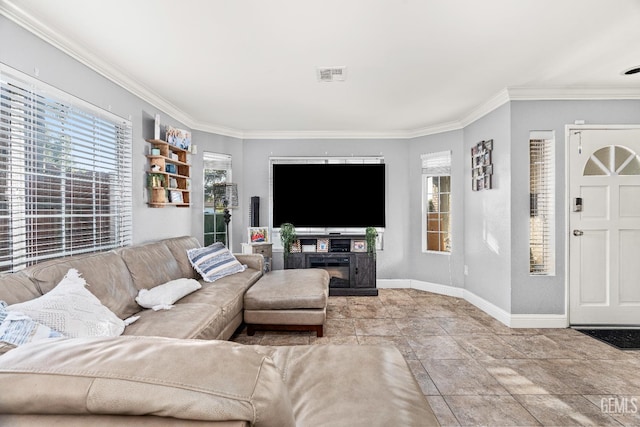 5104 Silver Crossing St, Bakersfield, CA 93313 - living area with baseboards, crown molding, stone finish floors, and a glass covered fireplace