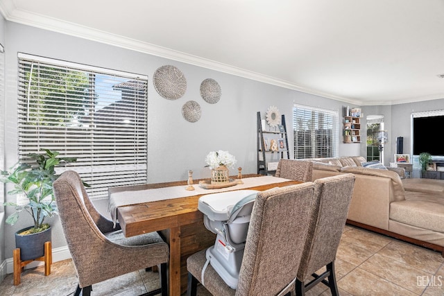 5104 Silver Crossing St, Bakersfield, CA 93313 - dining area featuring ornamental molding and light tile patterned floors