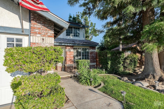 5104 Silver Crossing St, Bakersfield, CA 93313 - doorway to property featuring brick siding and stucco siding