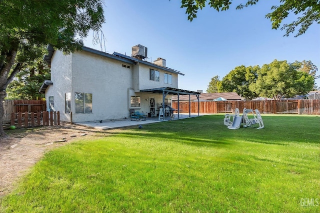 5104 Silver Crossing St, Bakersfield, CA 93313 - back of house featuring a chimney, stucco siding, and a patio area