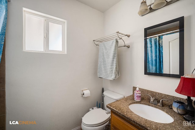 2209 Barnett St, Bakersfield, CA 93308 - bathroom featuring vanity and curtained shower