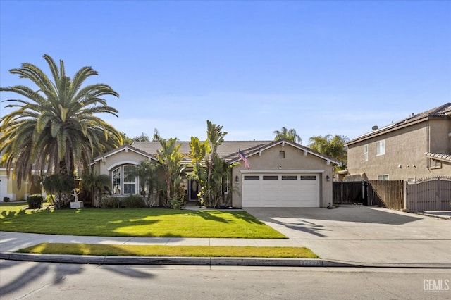 view of front facade with a garage and a front yard