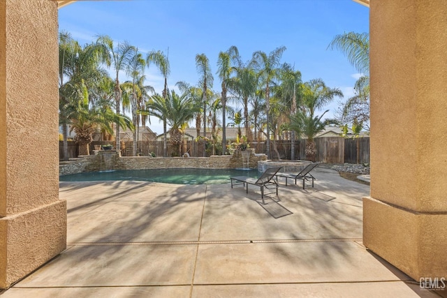 view of pool featuring a patio and pool water feature