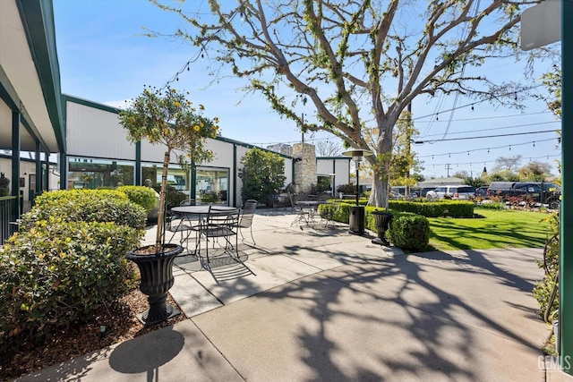 view of home's community featuring a patio