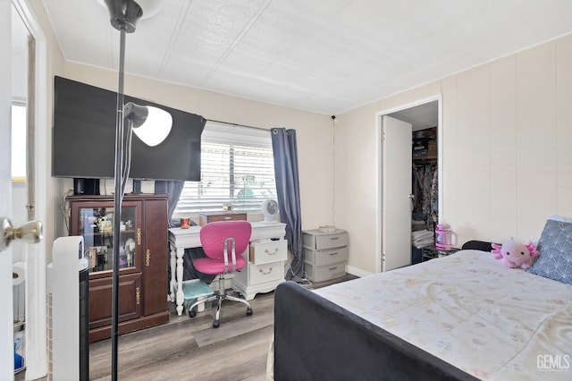 3601 S Chester Ave Unit 12, Bakersfield, CA 93304 - bedroom with wood finished floors and an office area