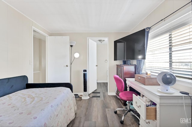 3601 S Chester Ave Unit 12, Bakersfield, CA 93304 - bedroom featuring wood finished floors and baseboards