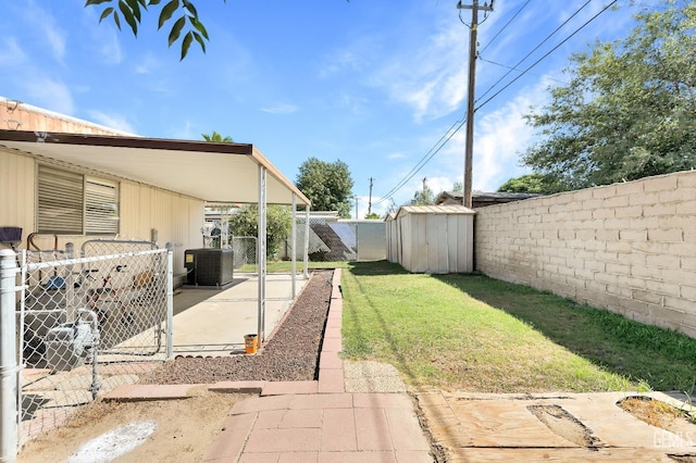 3601 S Chester Ave Unit 12, Bakersfield, CA 93304 - fenced backyard with a storage unit and a patio area