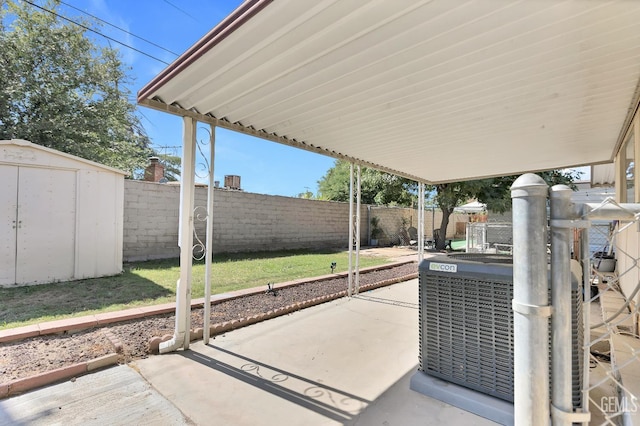 3601 S Chester Ave Unit 12, Bakersfield, CA 93304 - fenced backyard featuring a patio and a shed