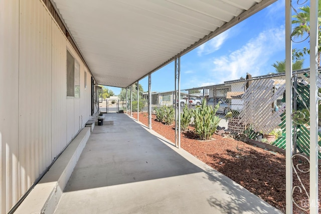 3601 S Chester Ave Unit 12, Bakersfield, CA 93304 - view of patio / terrace featuring a residential view and a carport