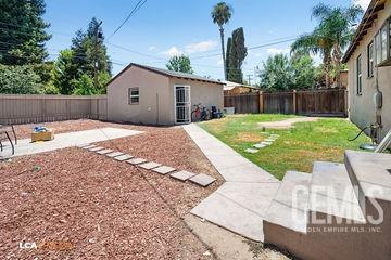 view of yard featuring a patio area and a fenced backyard