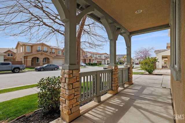 view of patio featuring a residential view and covered porch