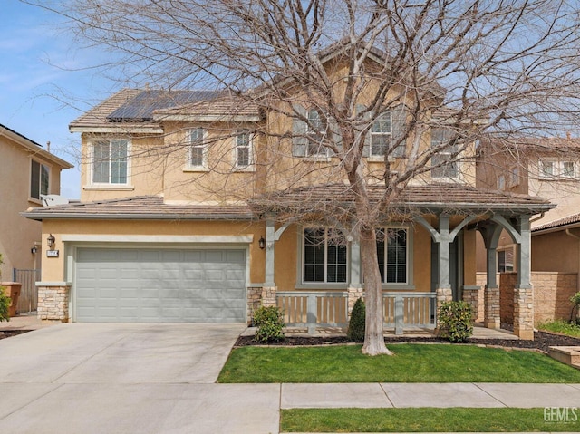 view of front of home featuring stucco siding, a porch, and stone siding