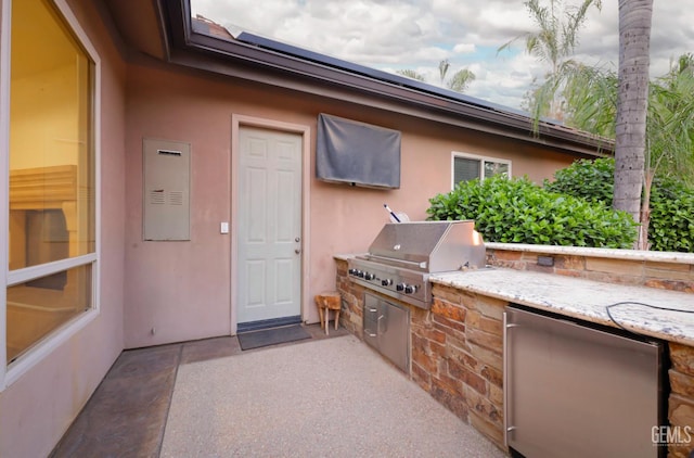 12603 Clay Creek Ct, Bakersfield, CA 93312 - view of patio / terrace featuring exterior kitchen