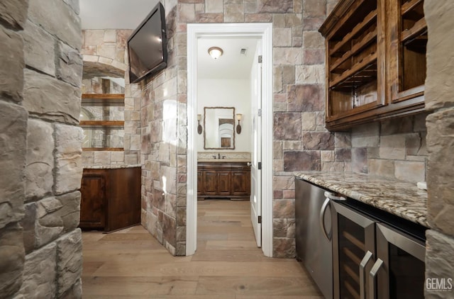 12603 Clay Creek Ct, Bakersfield, CA 93312 - bar area with light wood-style flooring and wine cooler