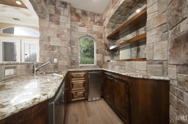 12603 Clay Creek Ct, Bakersfield, CA 93312 - indoor wet bar featuring dishwasher, light wood-type flooring, and decorative backsplash