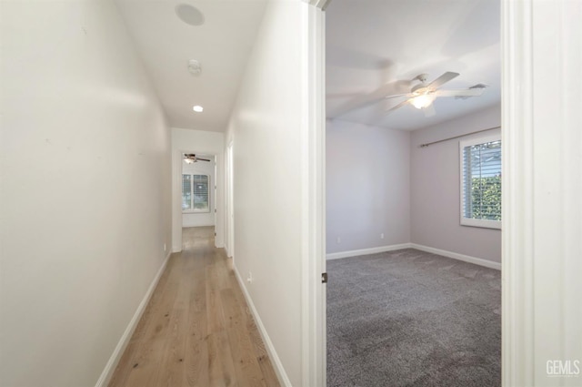 12603 Clay Creek Ct, Bakersfield, CA 93312 - corridor with light wood finished floors and recessed lighting