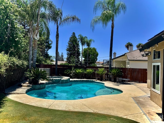 5322 Windriver Dr, Bakersfield, CA 93312 - view of swimming pool with a fenced backyard, a patio, and a pool with connected hot tub