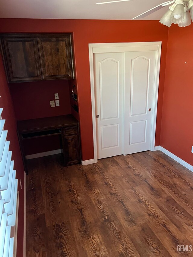 5322 Windriver Dr, Bakersfield, CA 93312 - unfurnished bedroom featuring dark wood-style floors, a closet, and ceiling fan