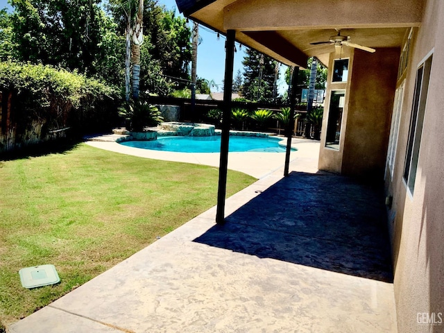 5322 Windriver Dr, Bakersfield, CA 93312 - view of swimming pool with ceiling fan, a patio, and a fenced backyard